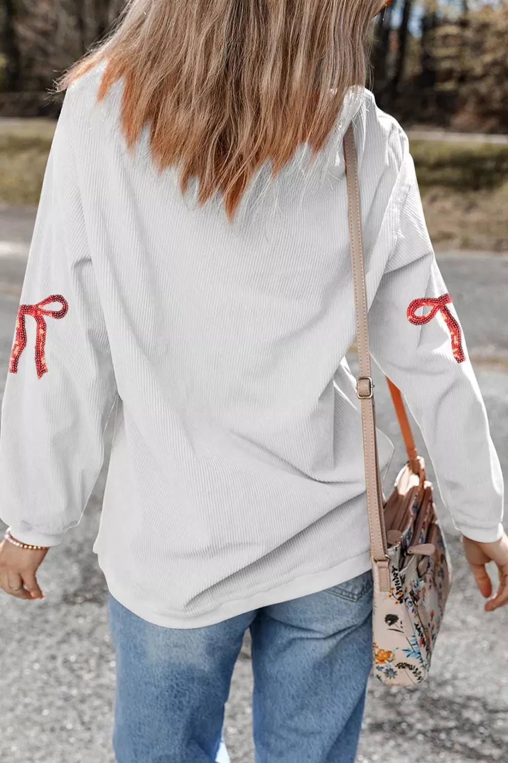 Valentine's Day XOXO Bowknot Oversized Sweatshirt sold by Charming Charlie product image thumbnail 3