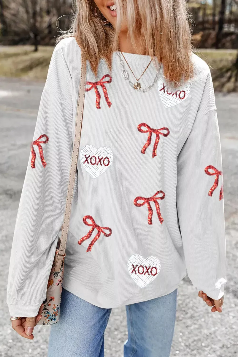 Valentine's Day XOXO Bowknot Oversized Sweatshirt sold by Charming Charlie product image thumbnail 4