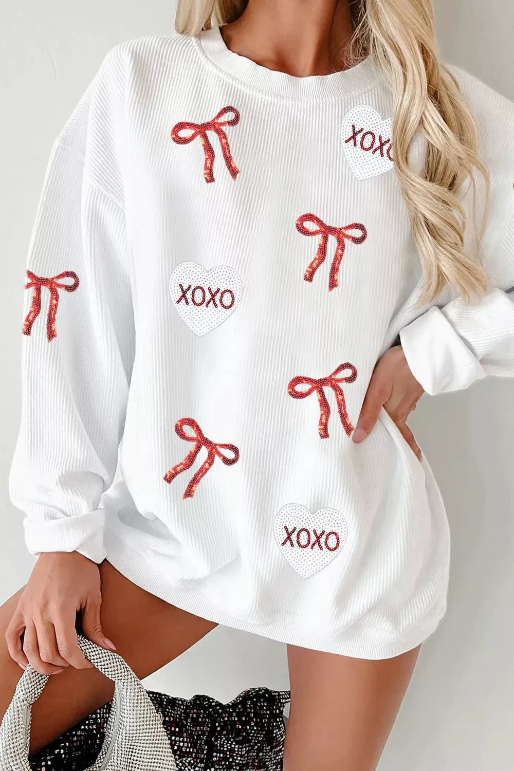 Valentine's Day XOXO Bowknot Oversized Sweatshirt sold by Charming Charlie