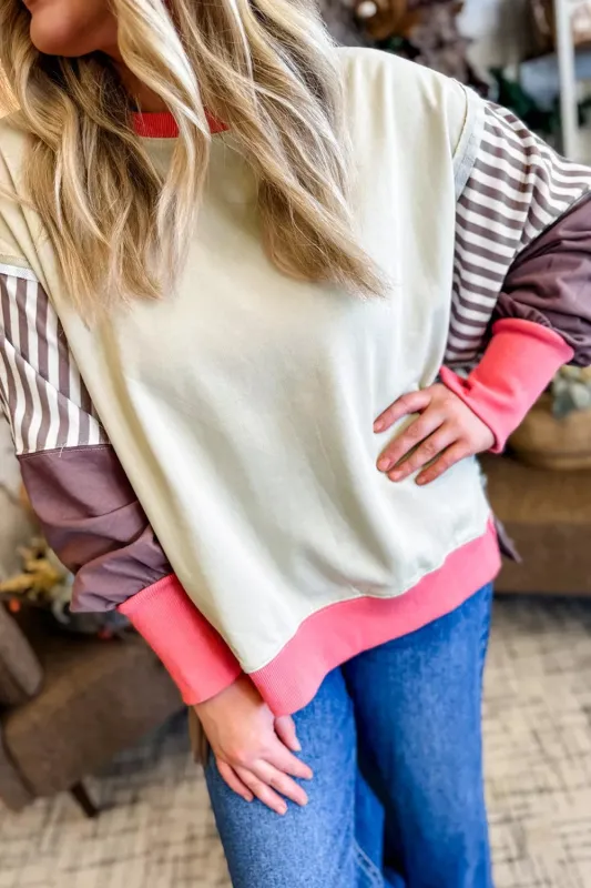 Color Block Striped Patchwork Dolman Slit Sweatshirt sold by Charming Charlie