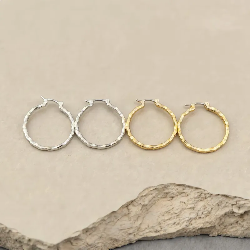 Silver and Gold Faceted Hoop Earrings made by Charming Charlie