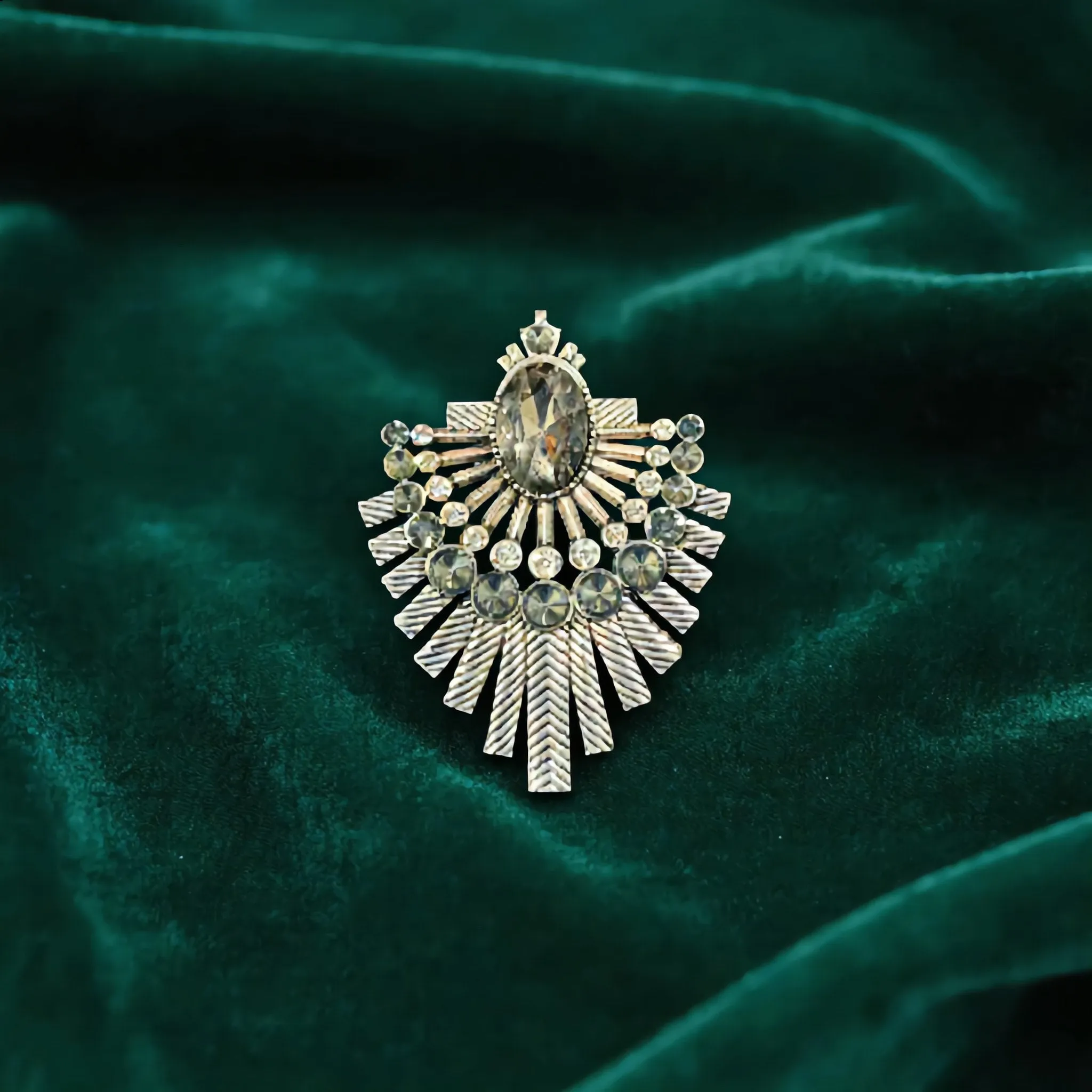 Vintage-Inspired Smoky Crystal & Silver Sunburst Pendant sold by Charming Charlie