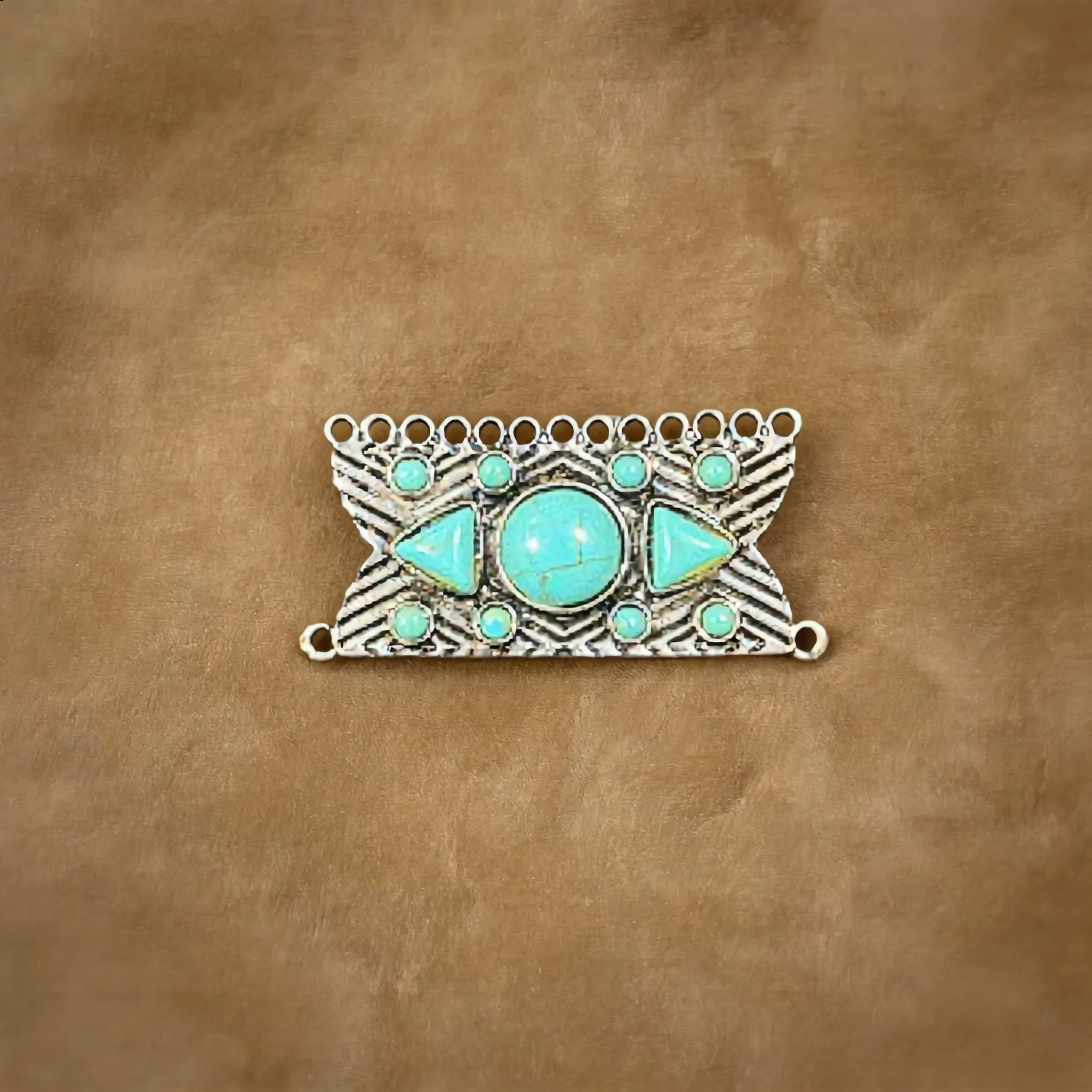 Silver Tone Bow Tie Pendant sold by Charming Charlie