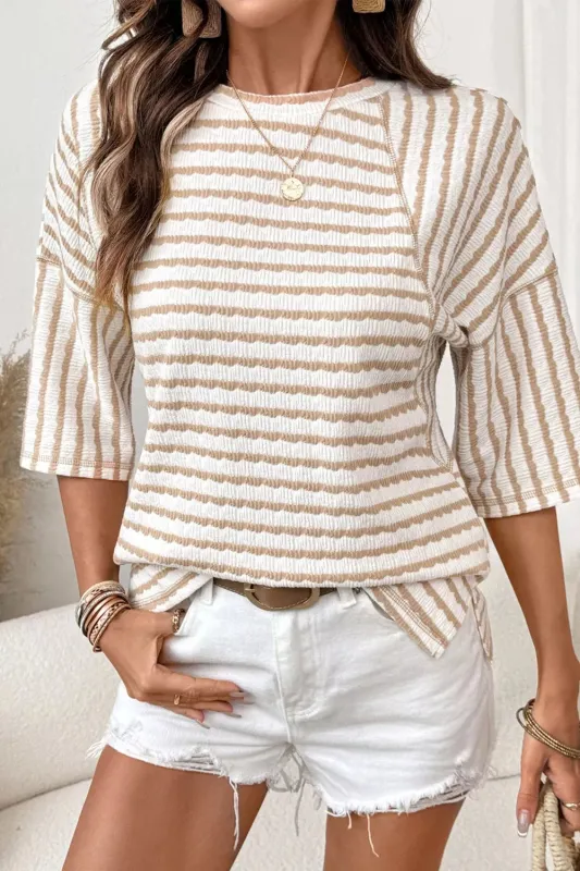 Stripe Textured Knit Split Hem Half Sleeve Loose Top sold by Charming Charlie