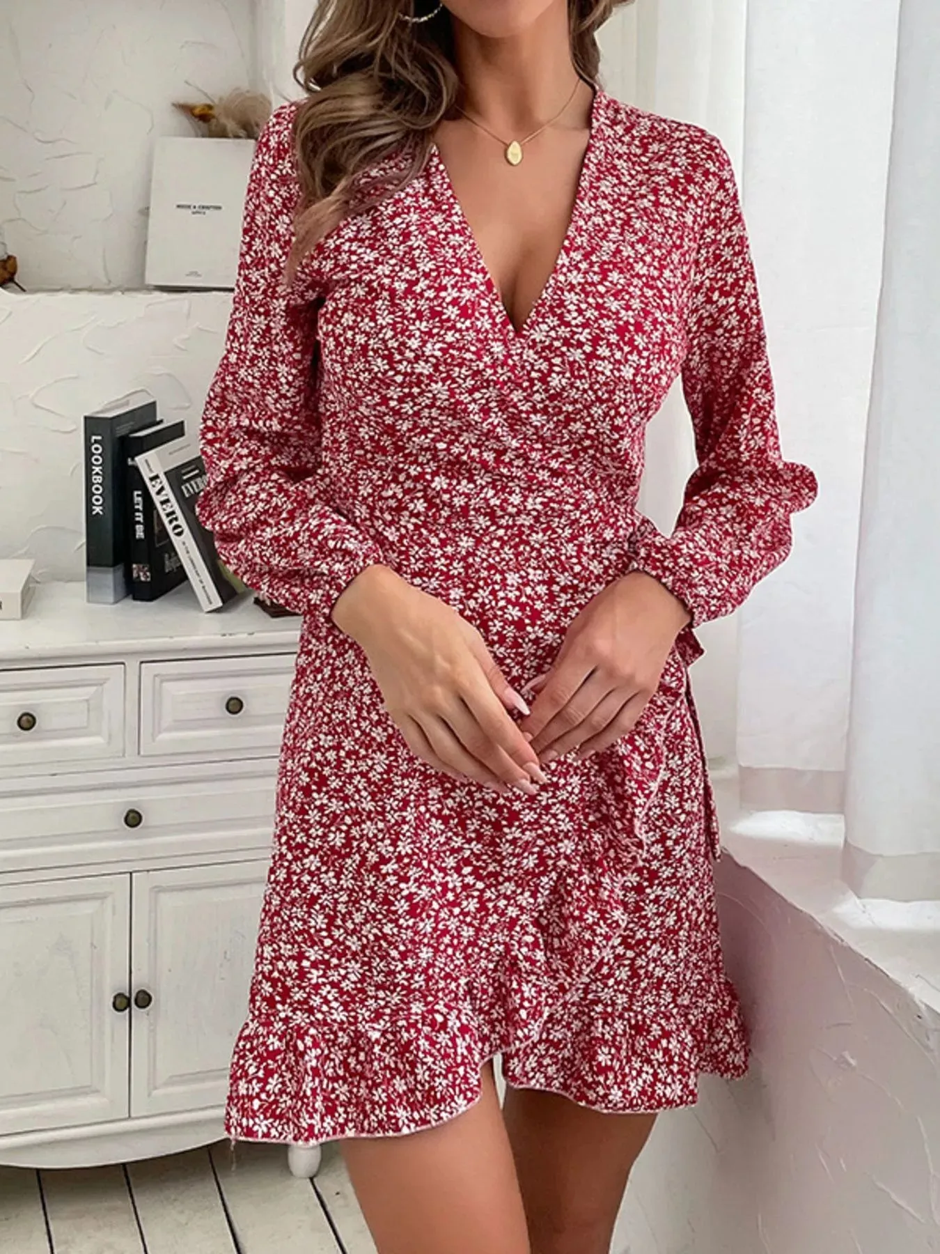 Floral Print Wrap Mini Dress sold by Charming Charlie