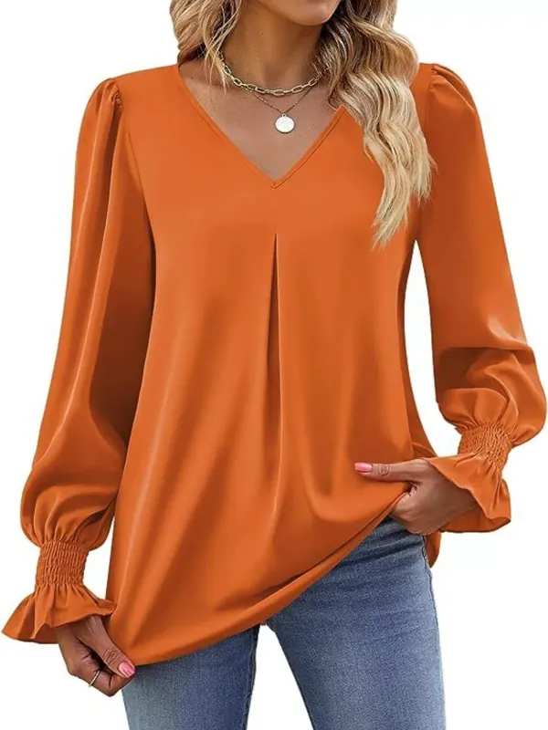 V-Neck Long Sleeve Ruffle Cuff Blouse sold by Charming Charlie