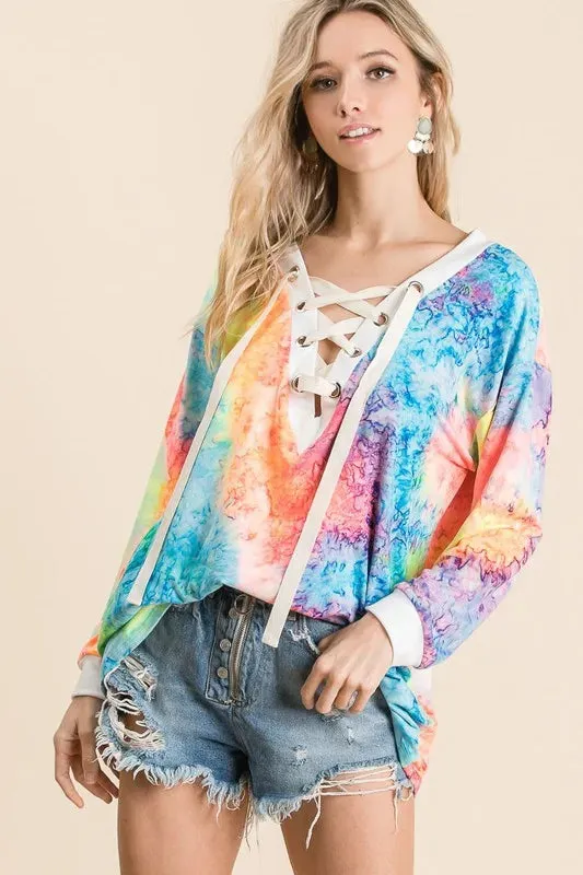 BiBi Tie Dye Deep V-neck Top With Lace Up Front sold by Charming Charlie