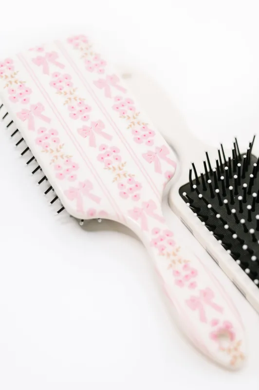 Girly Girl Bow and Floral Hair Brush made by Charming Charlie