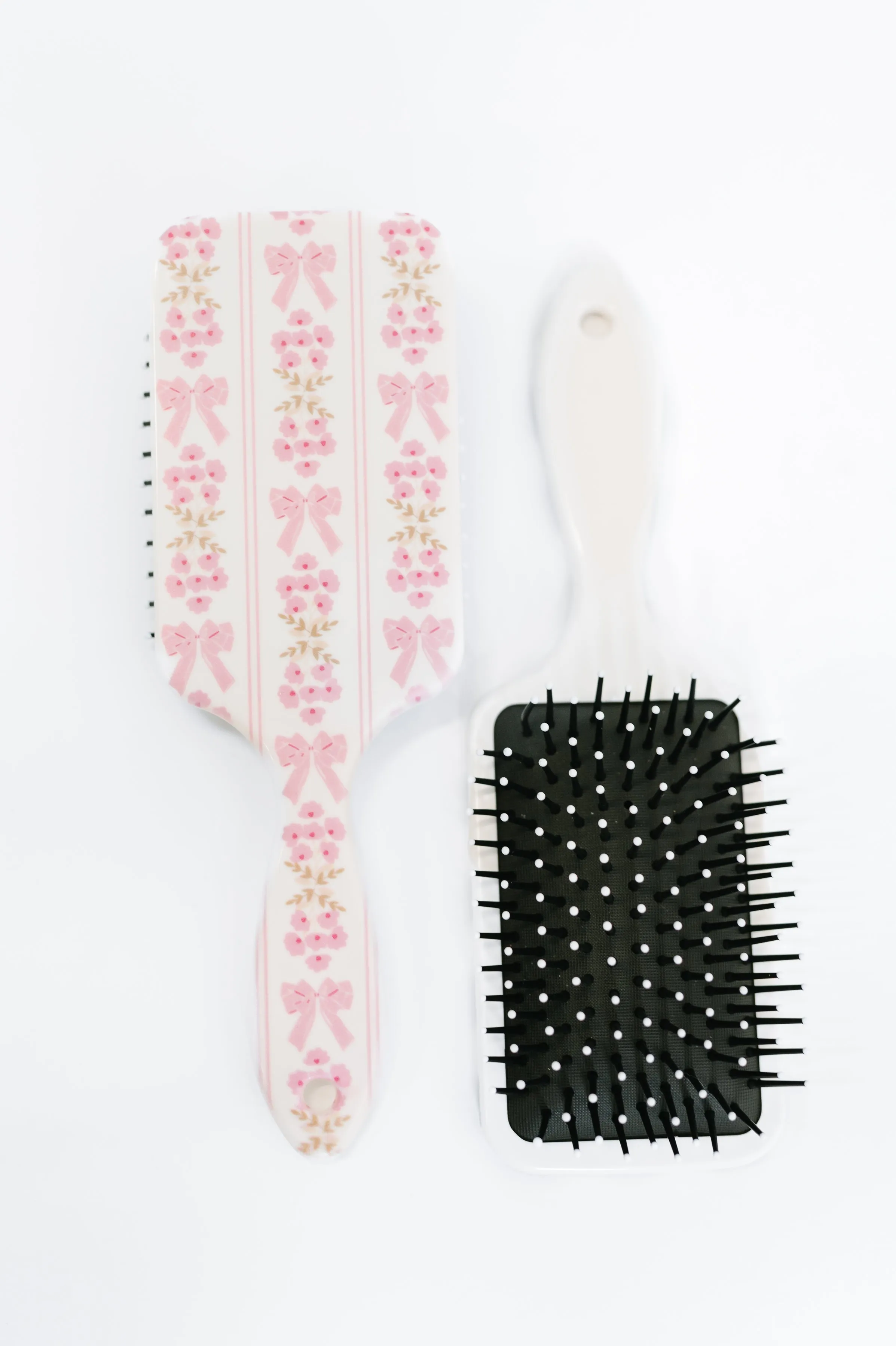 Girly Girl Bow and Floral Hair Brush sold by Charming Charlie product image thumbnail 2