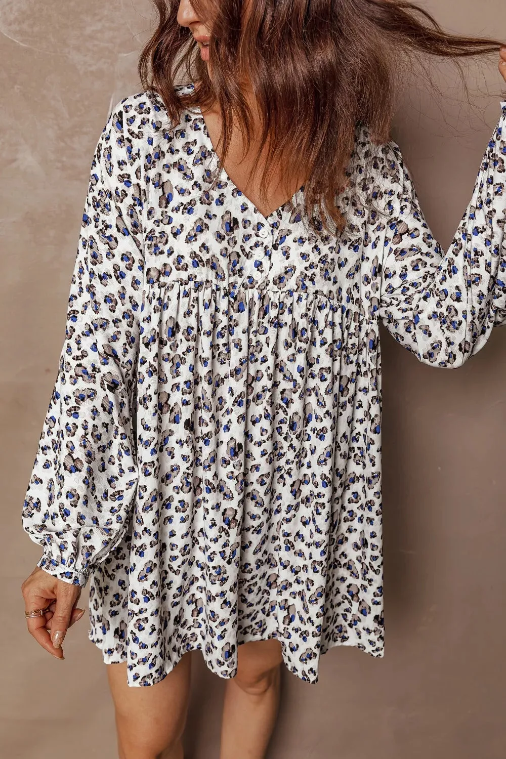 Multicolour Leopard Print V Neck Button Detail Long Sleeve Mini Dress sold by Charming Charlie product image thumbnail 5