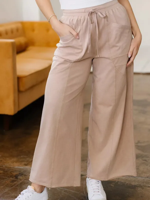 Solid Color Mineral Wash Piping Trim Pocketed Wide Leg Pants sold by Charming Charlie
