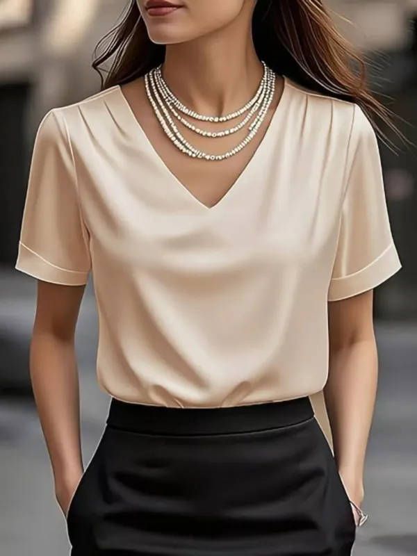 V-Neck Short Sleeve Satin Blouse sold by Charming Charlie