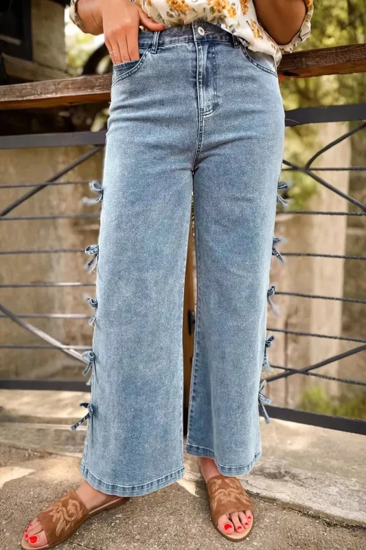 Bow Knot Side Detail Straight Leg Loose Jeans sold by Charming Charlie