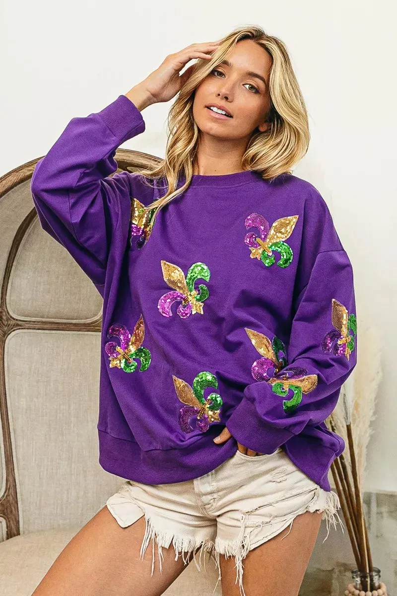 BiBi Fleur De Lis Sequin Patches Mardi Gras Sweatshirt sold by Charming Charlie