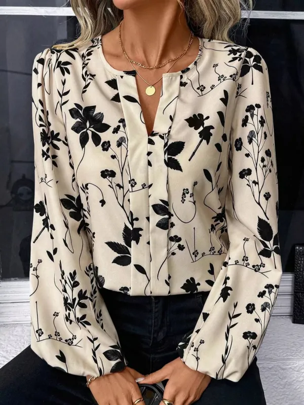 Floral Print Split Neck Long Sleeve Blouse sold by Charming Charlie