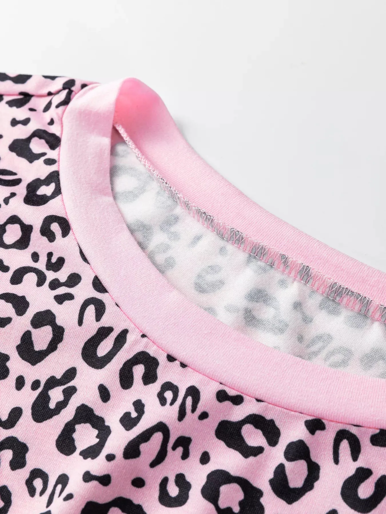 Leopard Striped Patchwork Side Slit Loose Short Sleeve Top sold by Charming Charlie product image thumbnail 5