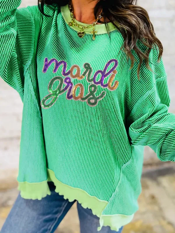 Twisted Ribbed Mardi Gras Sequin Top sold by Charming Charlie