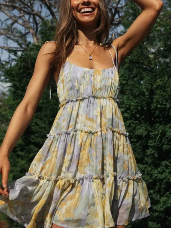 Floral Print Ruffle Tiered Mini Dress sold by Charming Charlie