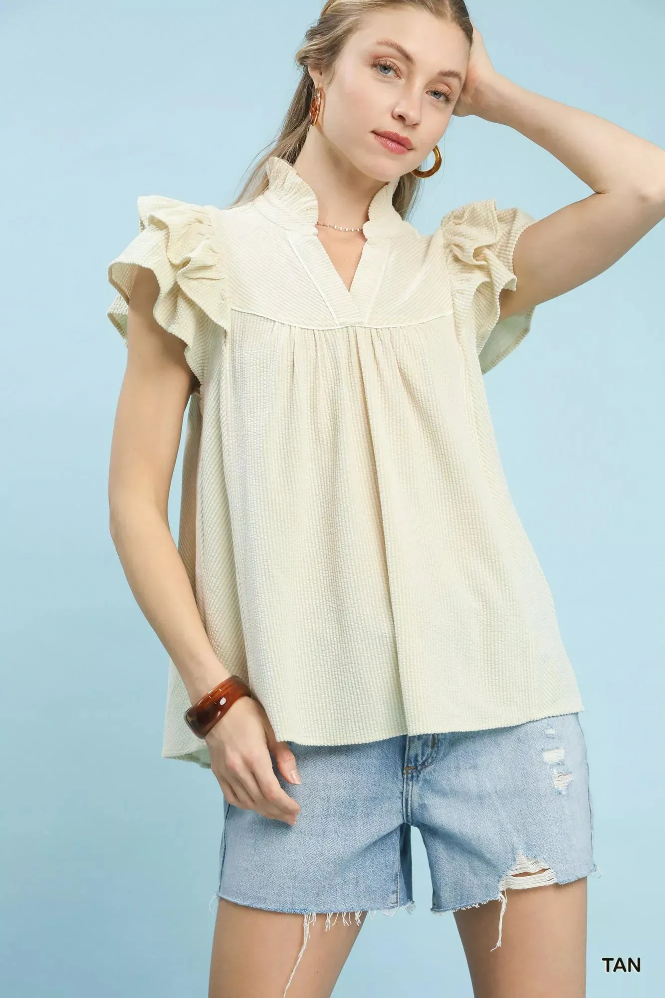 Umgee Ruffled Sleeve Textured Blouse sold by Charming Charlie