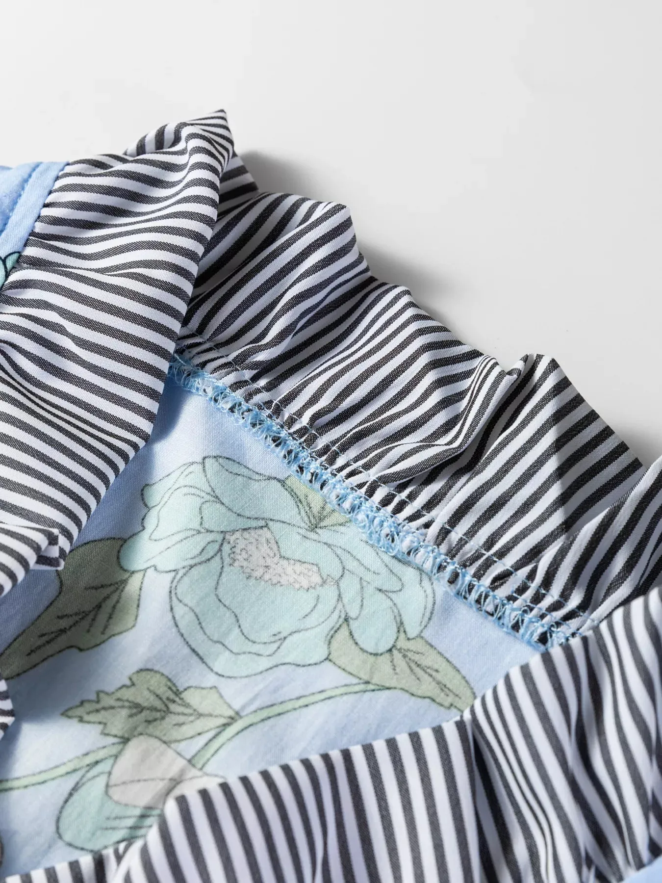 Floral Print Contrast Striped Trim Ruffled V Neck Fall Blouse sold by Charming Charlie product image thumbnail 5