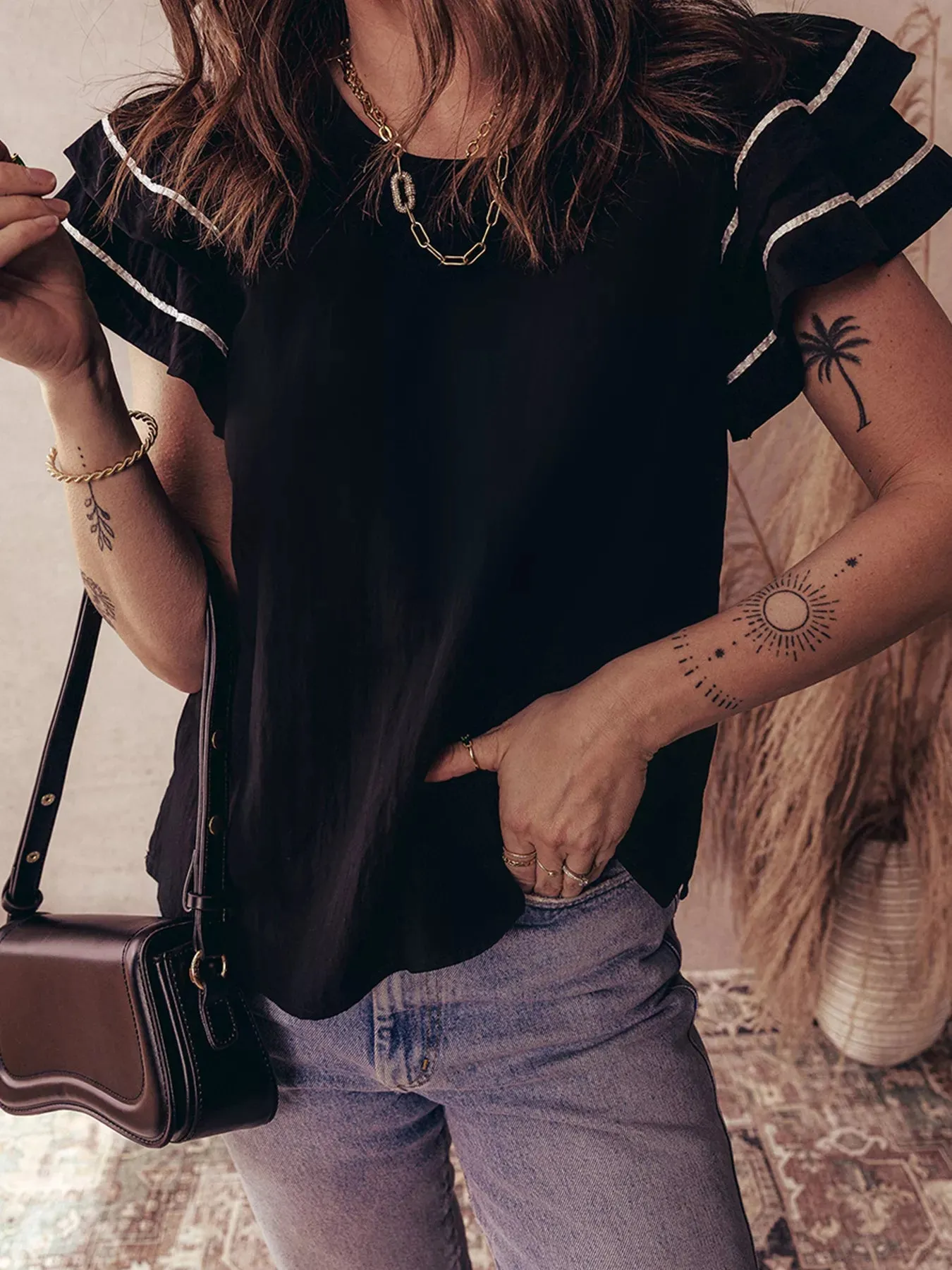 Contrast Trim Dual Ruffle Short Sleeve Textured Blouse sold by Charming Charlie