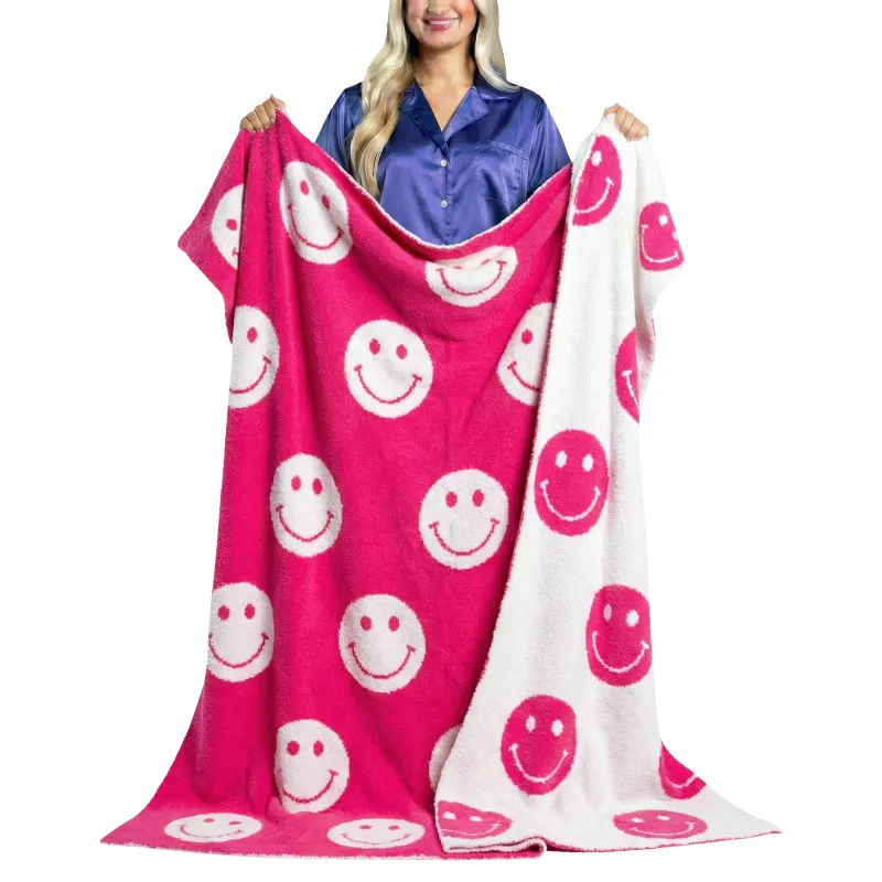 Sweet Smiles Blanket sold by Charming Charlie