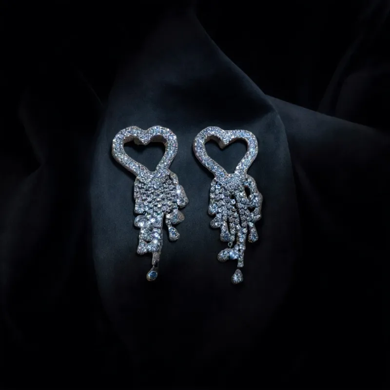 Dazzling Crystal Heart Drop Earrings sold by Charming Charlie