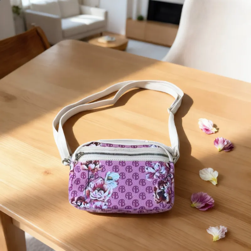 Alexis Bendel Purple Floral Mini Crossbody Bag sold by Charming Charlie