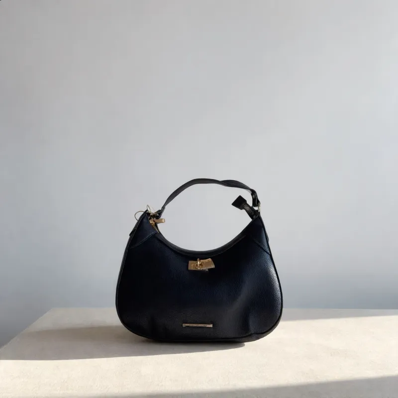 Black Leather Hobo Bag with Padlock sold by Charming Charlie