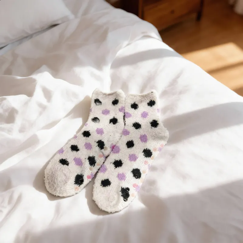 Ultra-Cozy White Fuzzy Slipper Socks sold by Charming Charlie