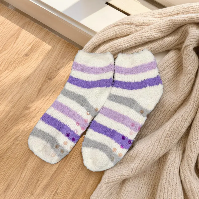 Ultra-Cozy Striped Non-Slip Fuzzy Socks sold by Charming Charlie