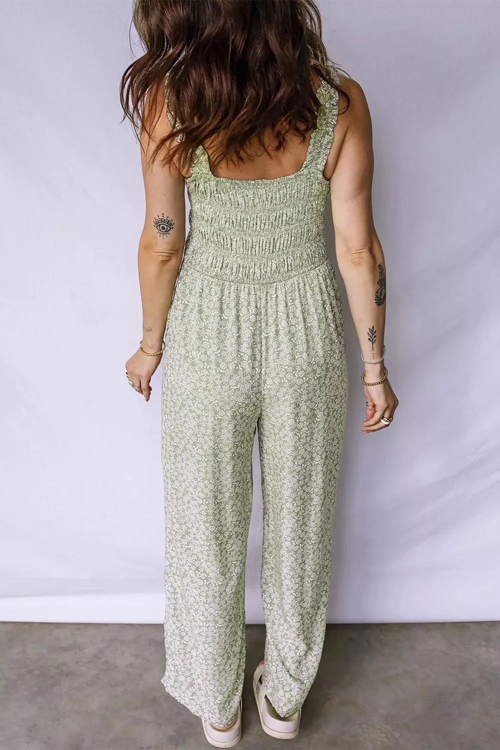 Smocked Bodice Square Neck Sleeveless Floral Jumpsuit sold by Charming Charlie product image thumbnail 4
