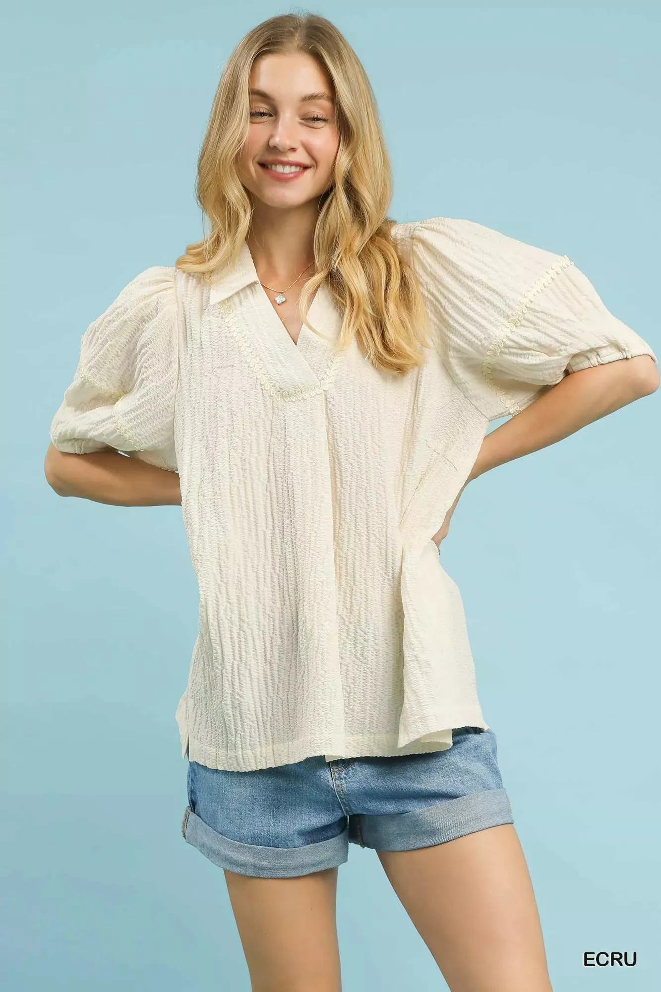 Umgee Textured Puff Sleeve Blouse sold by Charming Charlie
