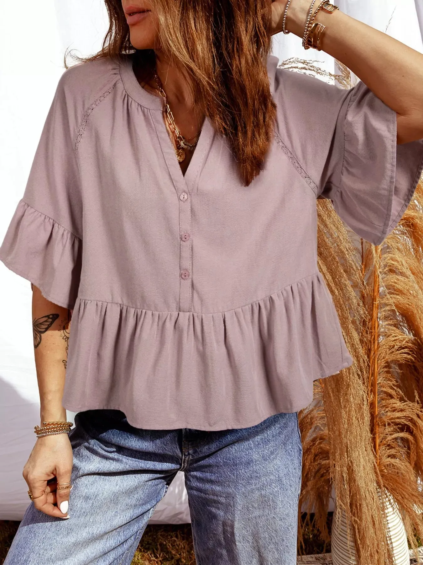Notched Ruffled Loose Blouse sold by Charming Charlie
