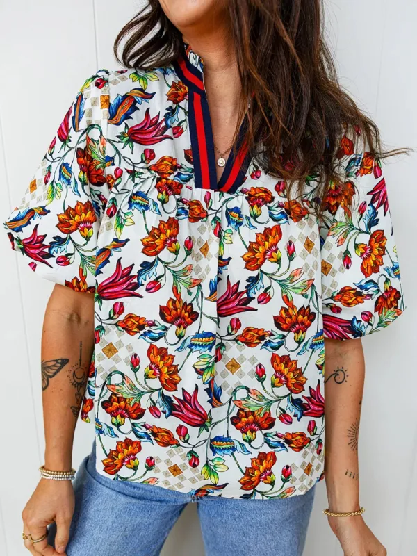 Multicolour Contrasted V Neckline Floral Puff Short Sleeve Blouse sold by Charming Charlie