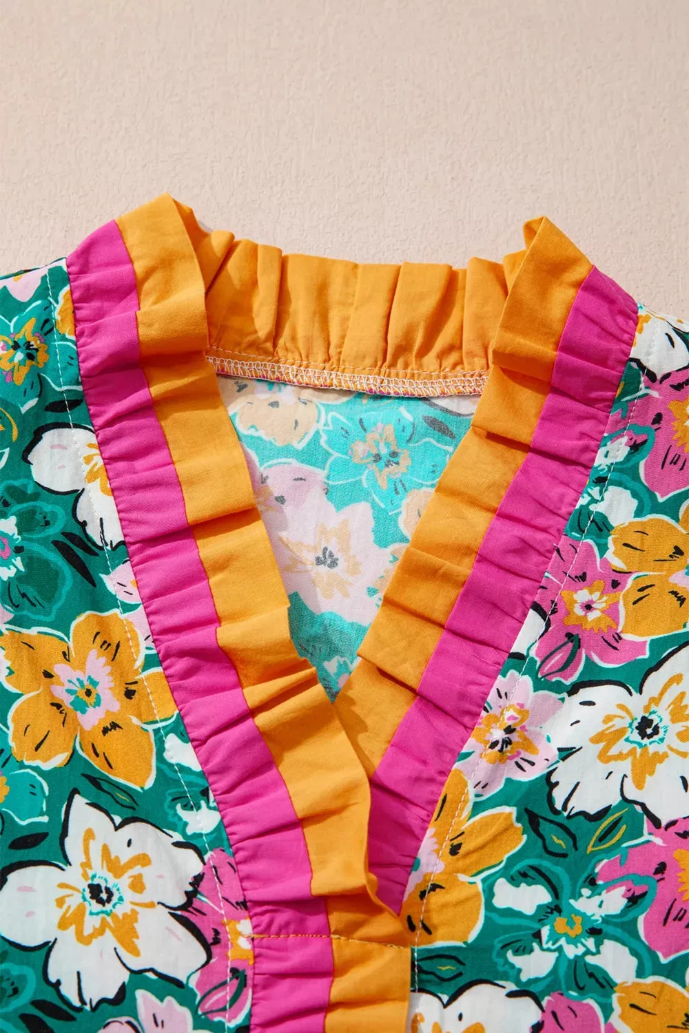 Floral Print Contrast Trim Frilled V Neck 3/4 Sleeve Blouse sold by Charming Charlie product image thumbnail 4