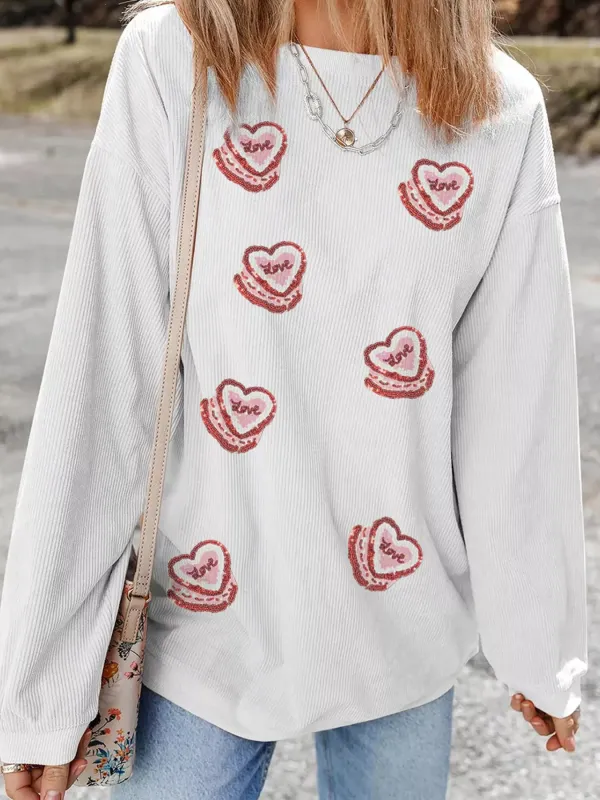 Sequin Love Heart Pattern Corded Valentines Sweatshirt sold by Charming Charlie