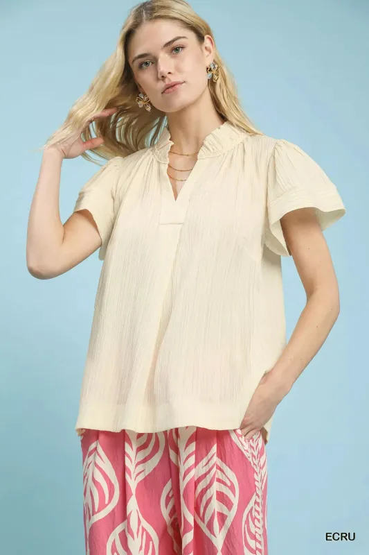 Umgee Texture Flutter Sleeve Notched Blouse sold by Charming Charlie