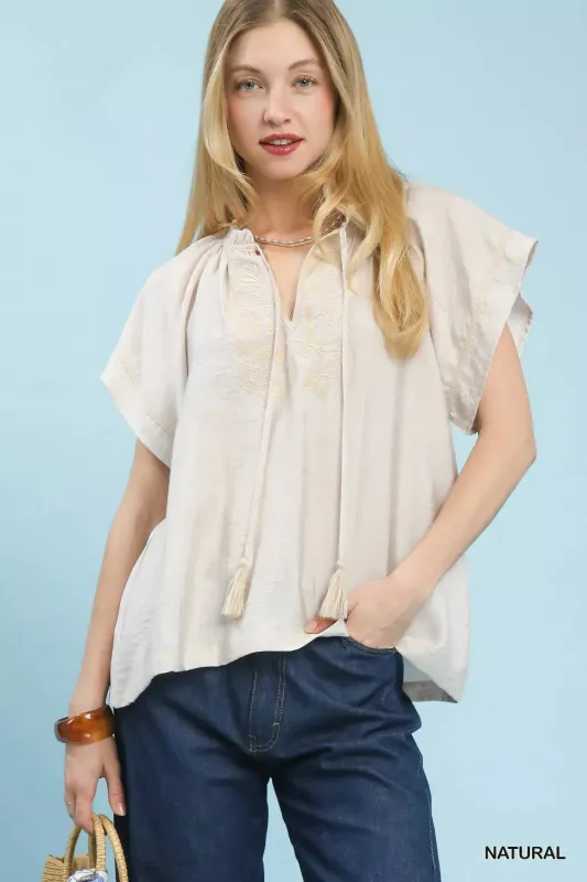 Umgee Embroidered Boho Blouse with Tassel Tie sold by Charming Charlie