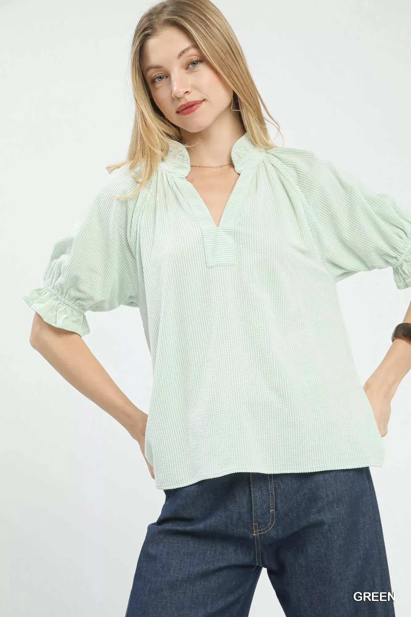 Umgee Textured Ruffle Sleeve V-Neck Top sold by Charming Charlie