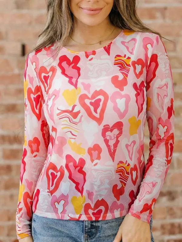 Valentine Heart Mesh Long Sleeve Top sold by Charming Charlie