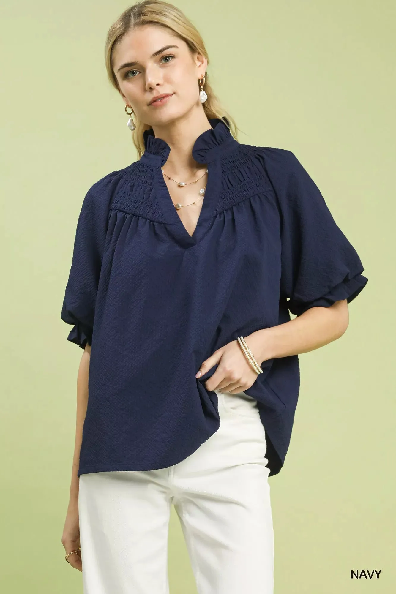 Umgee Textured Smocked Yoke Split-Neck Top sold by Charming Charlie