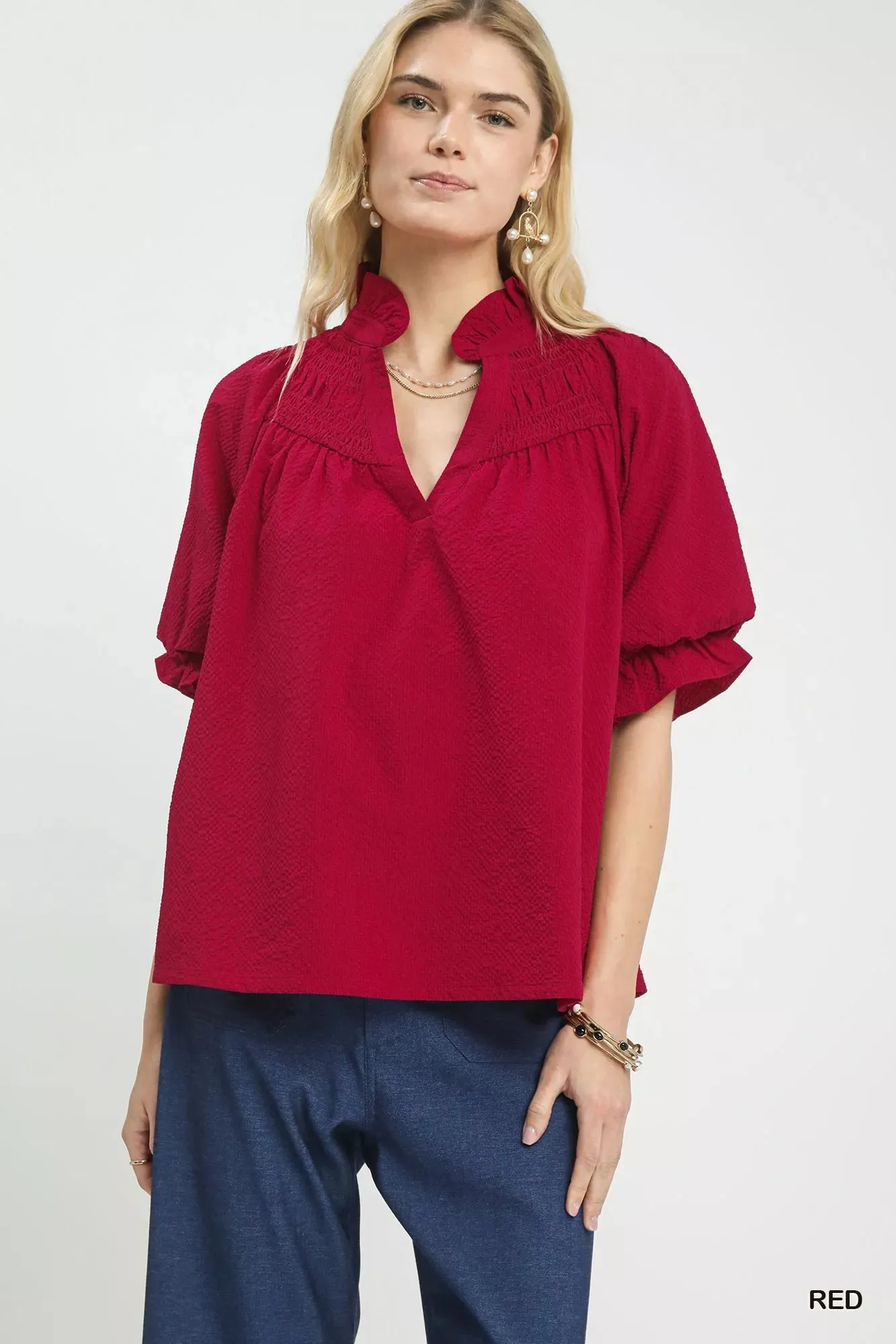 Umgee Textured Smocked Yoke Split-Neck Top sold by Charming Charlie