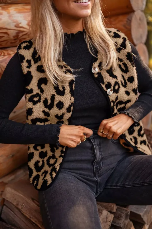 Leopard Print Sherpa Fleece Vest Coat sold by Charming Charlie