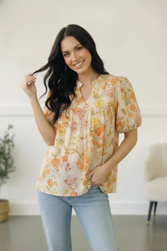 Sunlit Garden Notch Neck Blouse made by Charming Charlie