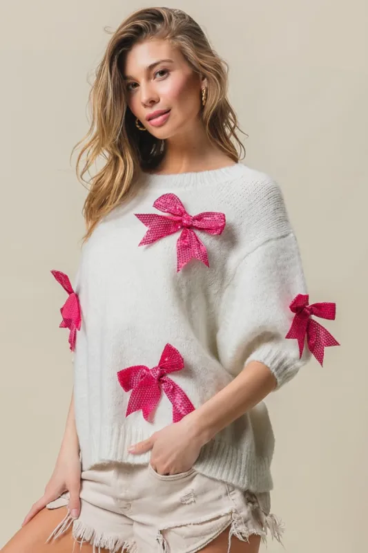 BiBi Sequin Bow Puff Sleeve Sweater sold by Charming Charlie