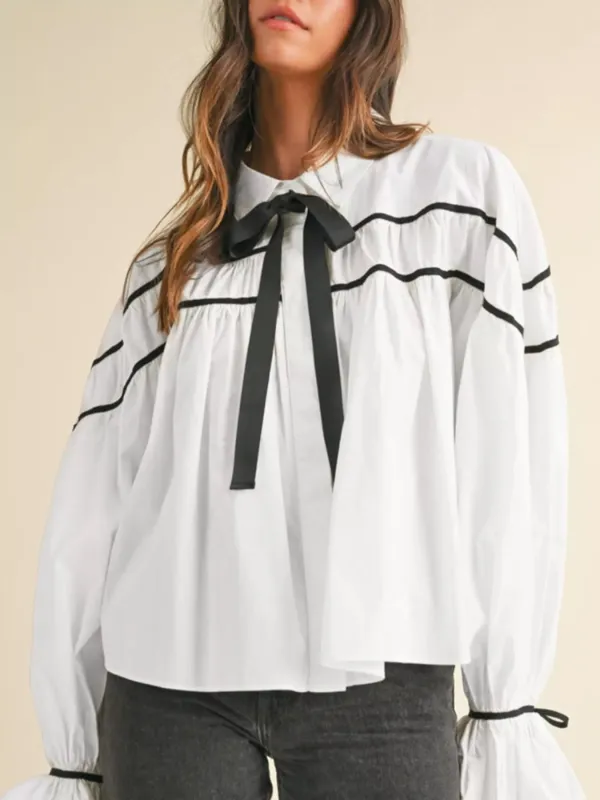 Elegant Contrast Bow-Tie Ruffle Blouse sold by Charming Charlie