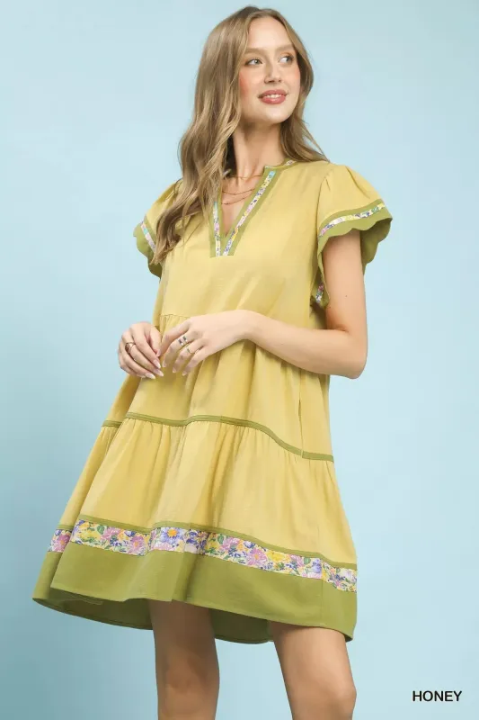 Umgee Linen Tiered Flutter Sleeve Dress with Floral Trim sold by Charming Charlie
