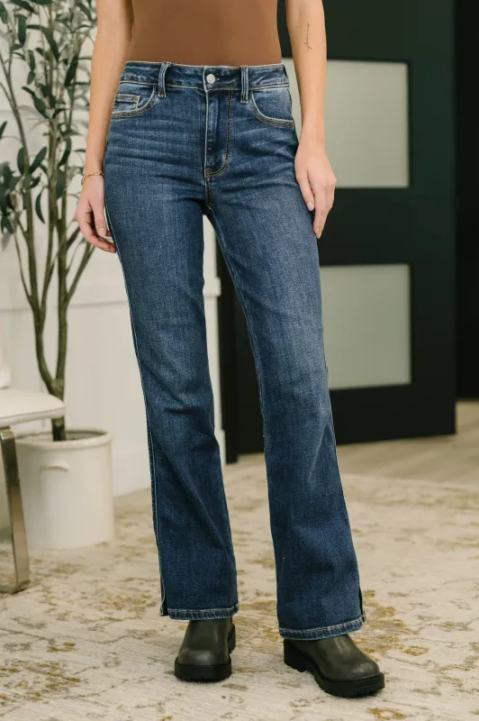 Casey Mid Rise Bootcut with Cell Phone Back Pocket & Slit sold by Charming Charlie