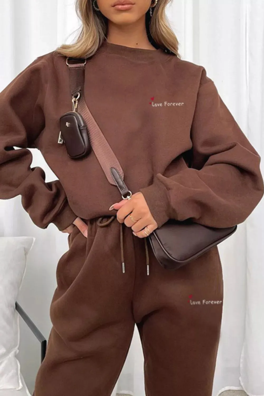 Round Neck Sweatshirt and Joggers Set sold by Charming Charlie product image thumbnail 2